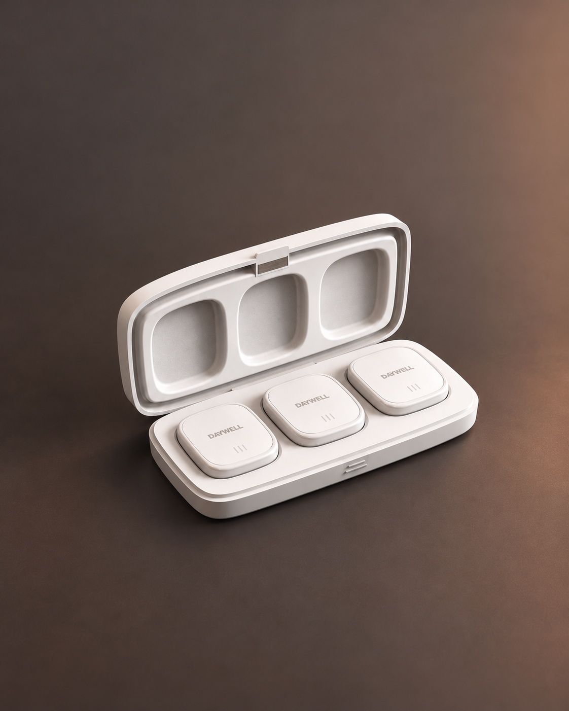 Three Daywell ECG nodes arranged inside their open carrying case